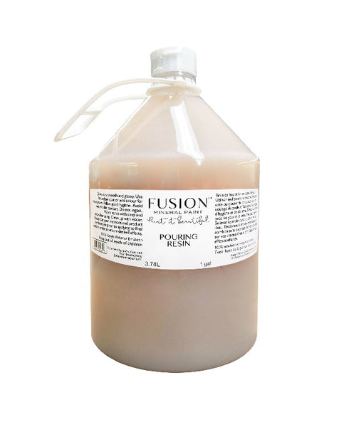 Fusion | Pouring Resin bottle on white background.