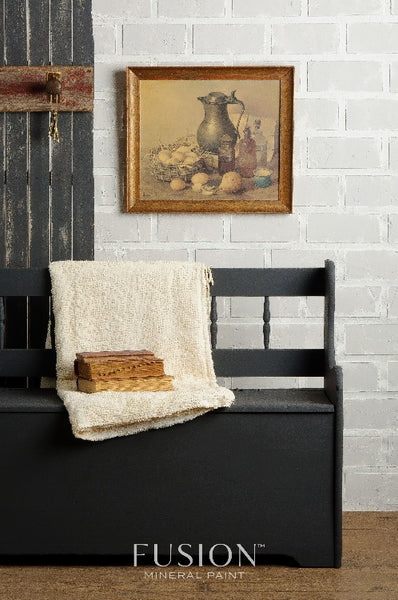 Fusion Mineral Paint |Ash painted bench with blanket and books.
