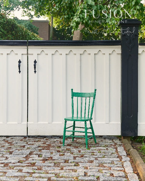 Fusion Mineral Paint | wooden chair painted in Park Bench in an outdoor environment.