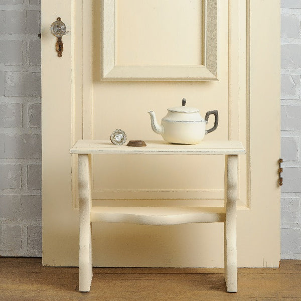 Fusion Mineral Paint | Teapot on table with door background painted in limestone