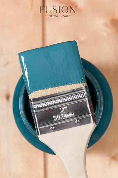 Fusion Mineral Paint | Paintbrush dipped in Seaside sitting on top of the paint jar.