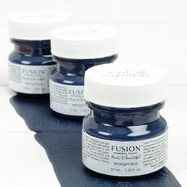 Fusion Mineral Paint | Three small jars of Midnight Blue on a white background with a paint streak down the middle.