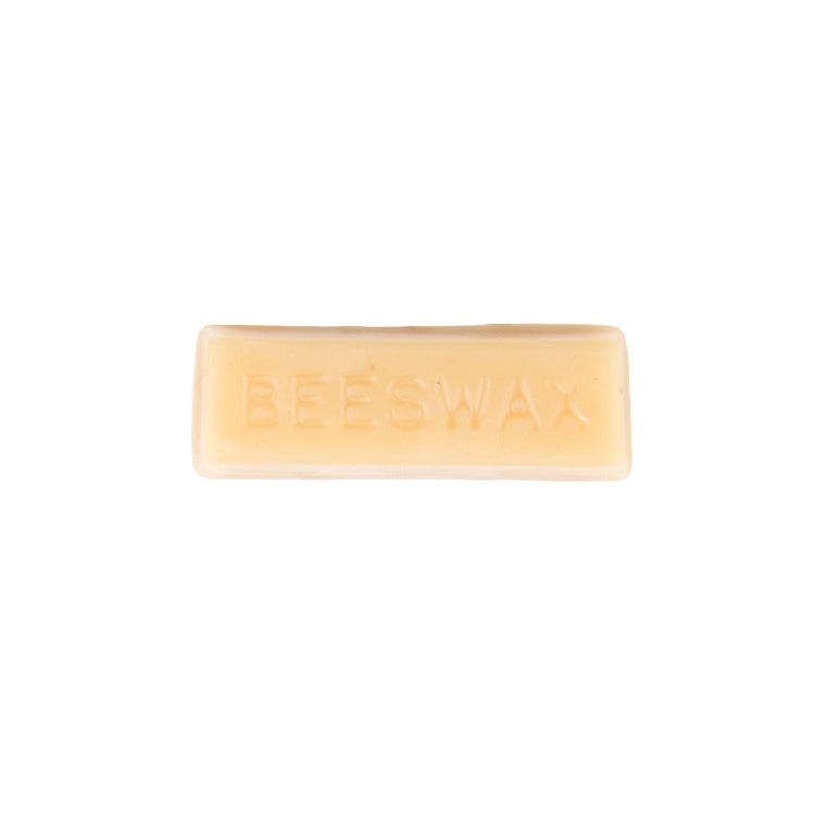 Fusion | Beeswax Distressing block on a white background.