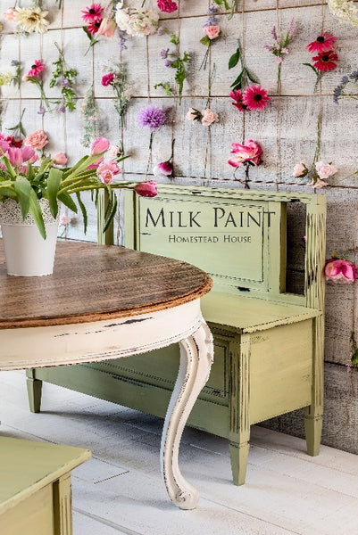 Milk Paint Homestead House | Gatineau painted bench on floral backdrop.