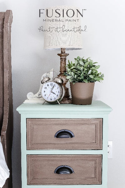 Fusion Mineral Paint | Brook painted night stand with brown drawers in a bedroom setting with other decor.