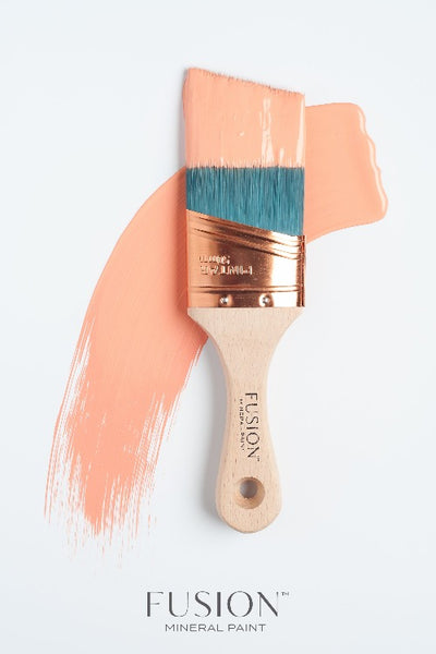 Fusion Mineral Paint |Paint Brush dipped in Coral with streak across white background. 