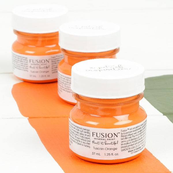 Fusion Mineral Paint | Three small jars of Tuscan Orange on a white background with a paint streak down the middle.