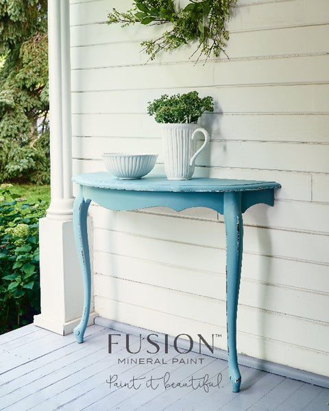 Fusion Mineral Paint | HAlf table painted with heirloom on a patio with other outdoor decor.