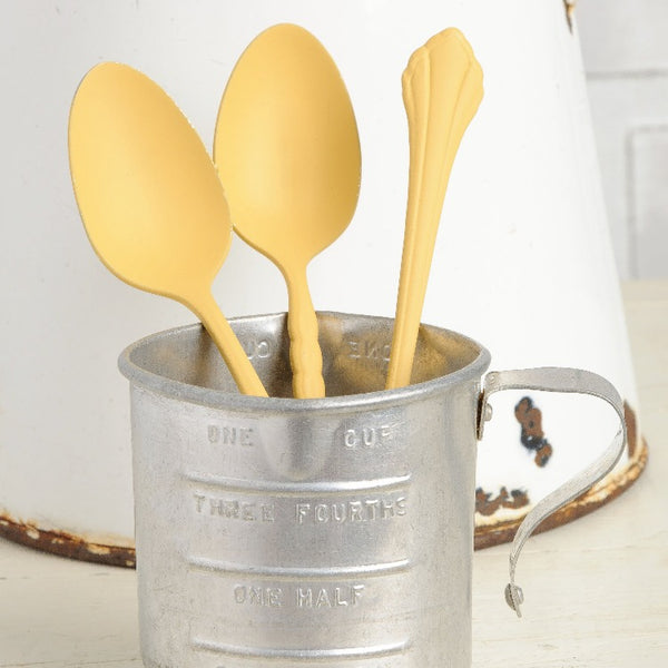Fusion Mineral Paint | Large Spoons painted in Prairie Sunset sitting in a metal measuring cup.
