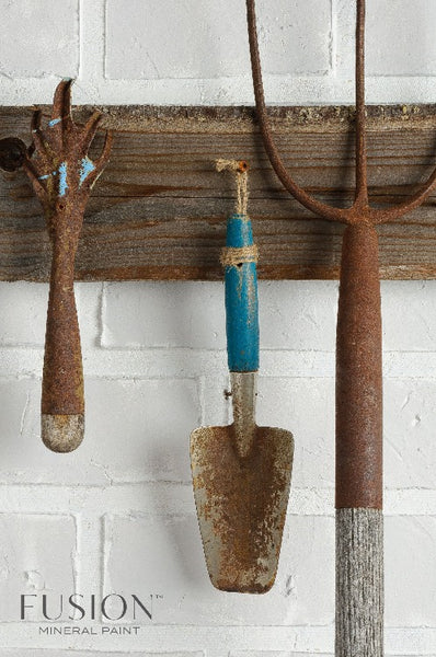 Fusion Mineral Paint | Tools hung up on a white brick wall.