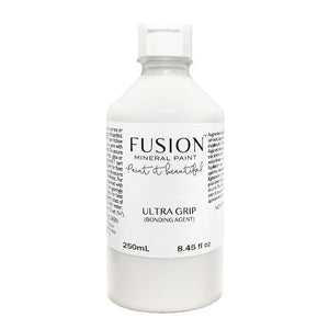 Fusion Mineral Paint | Ultra Grip Bonding Agent bottle on white background.