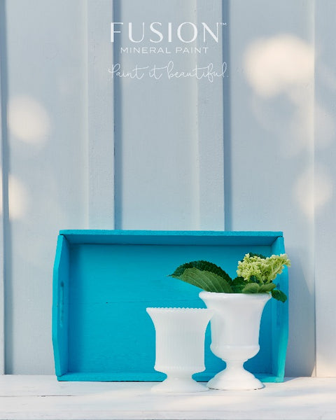 Fusion Mineral Paint | Azure painted tray leaning up against the wall with two flower vases in front.